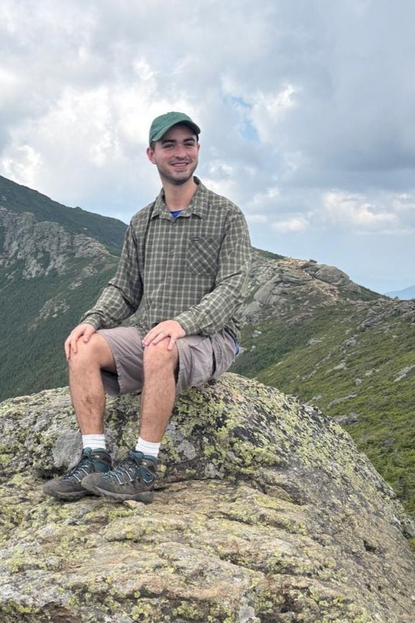 Nicolás Acevedo Villena, photographed outdoors on a ridge.